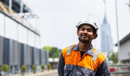 Engineer outside power plant