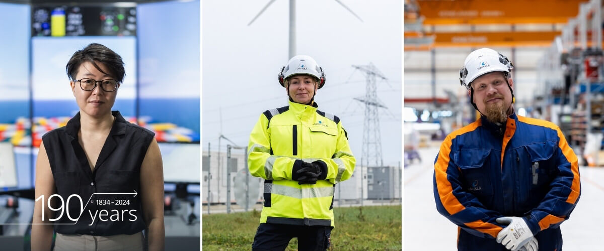 Three Wärtsilä employees looking proud and happy