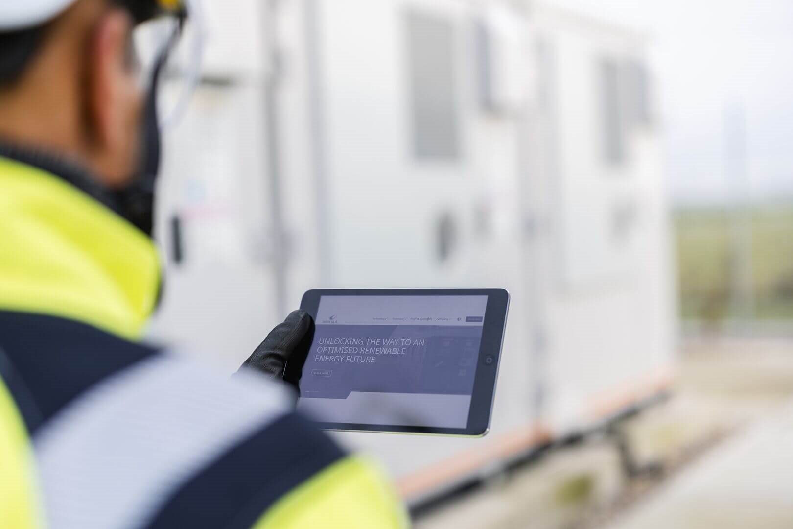 Service team member holding IPad