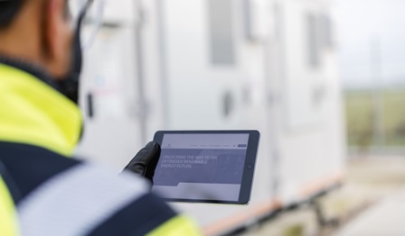 Service team member holding IPad