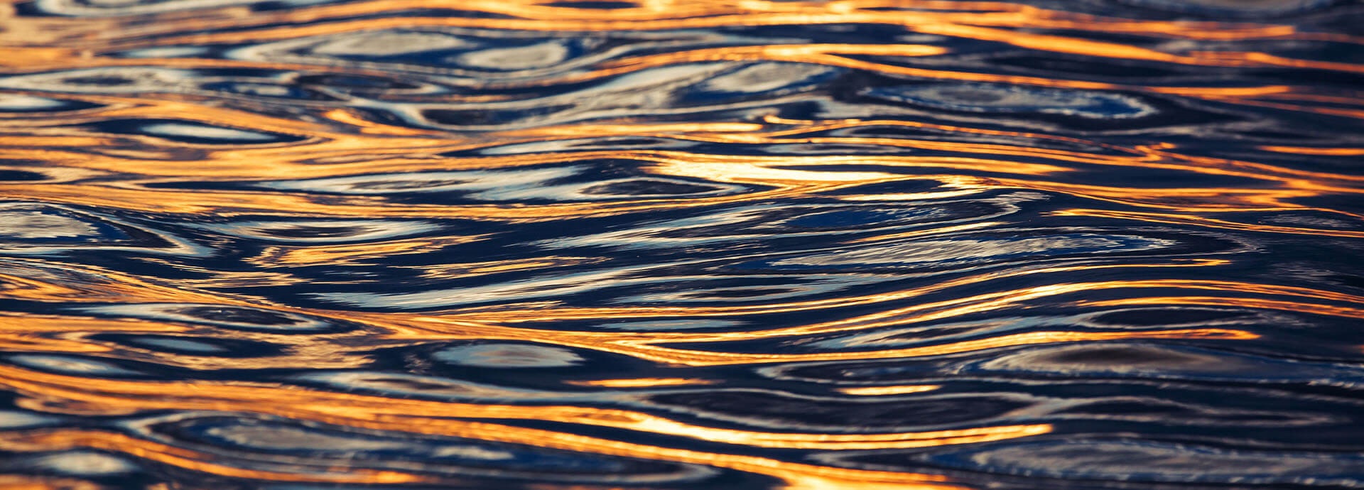 Golden-yellow, glittering water