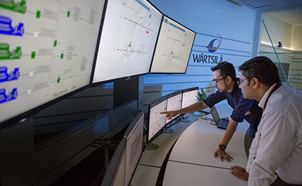 Wärtsilä employees monitor engines