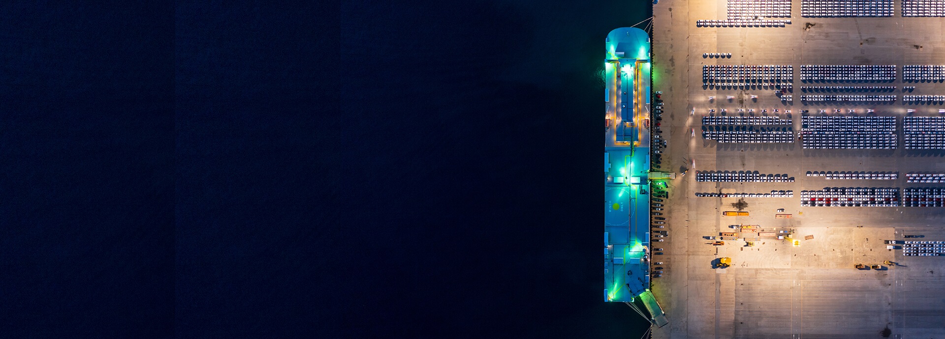 night-time image of a car carrier vessel