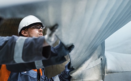 Man working on a propeller