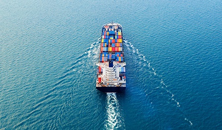 Container ship on the high seas, bird's-eye view