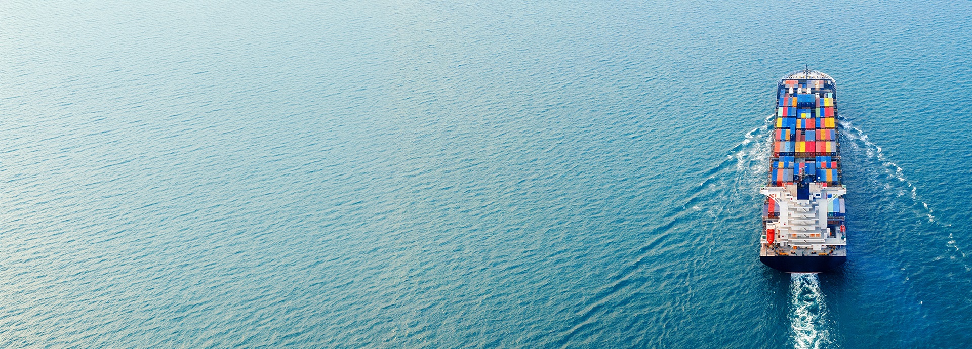 Container ship on the high seas, bird's-eye view