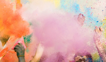 Diverse hands throwing paint bombs