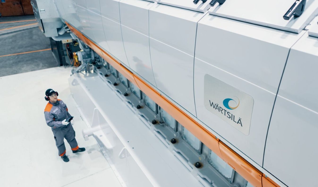 Man standing next to the W31SG engine