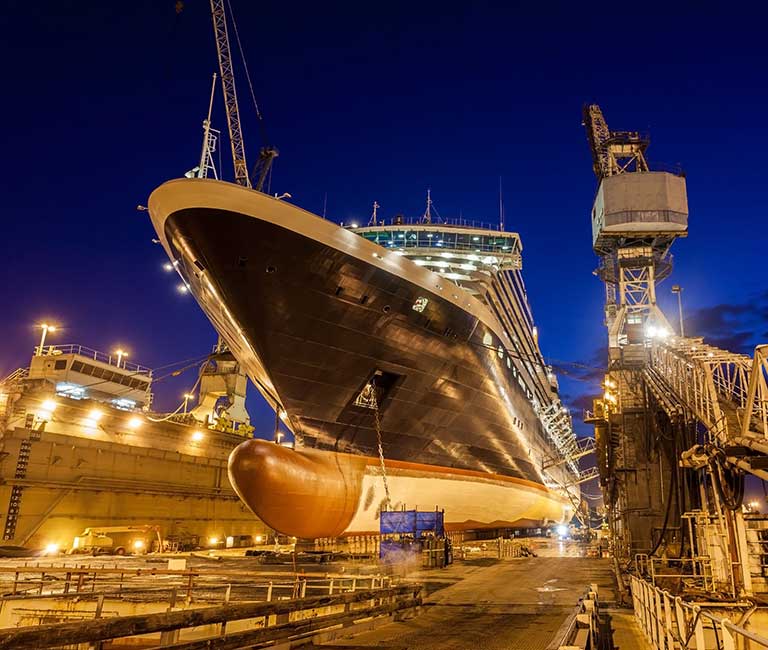Vessel in dock lit up at night