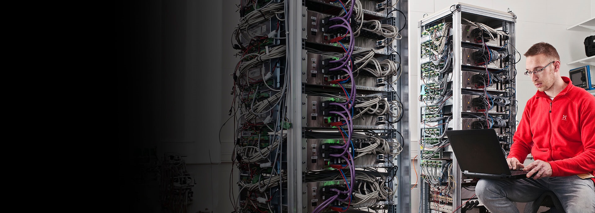 men working in a server room