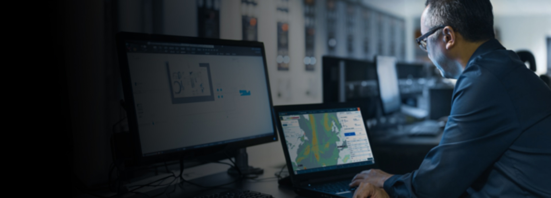 man in front of a monitor