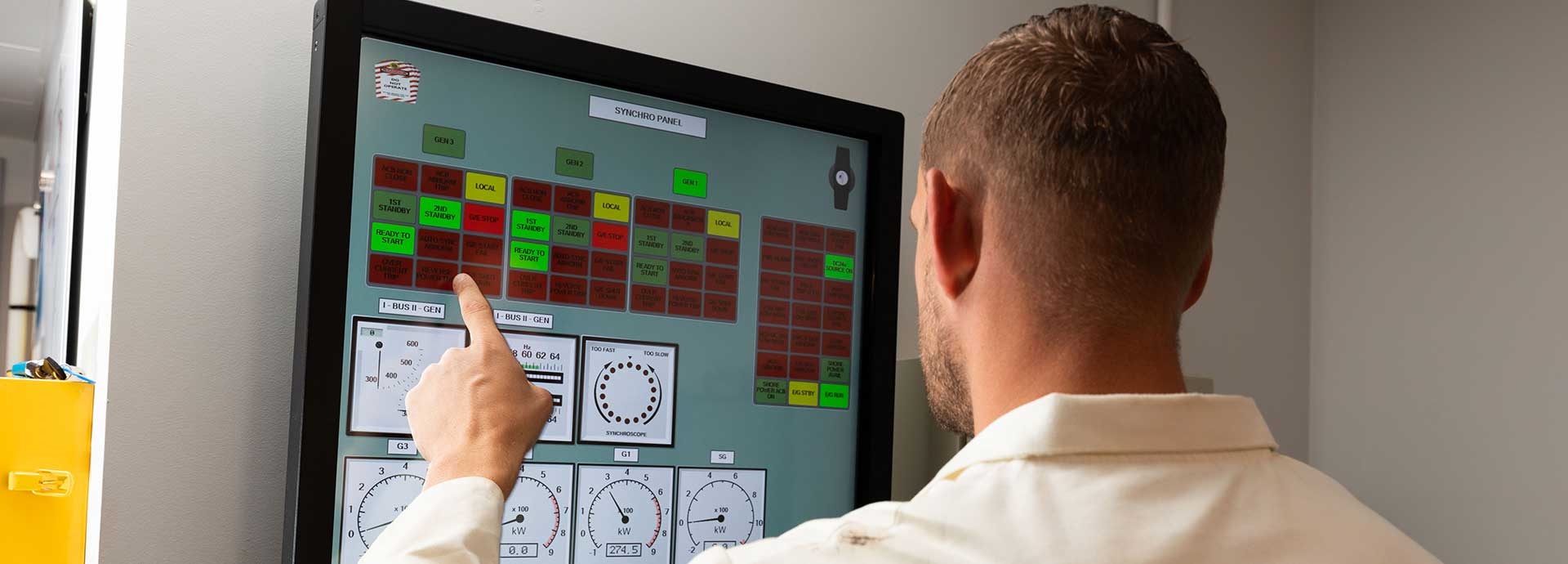 Man stands in front of simulator monitor