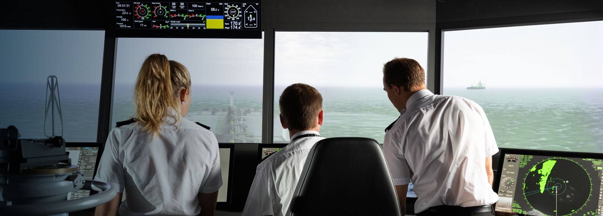 Navigation equipment on bridge with people