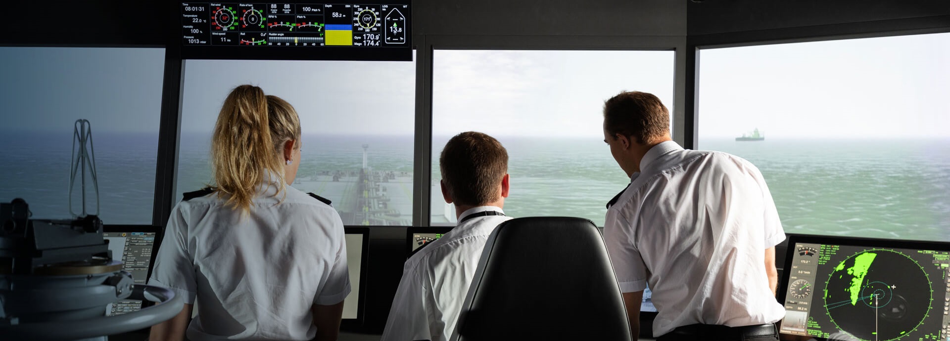 Navigation equipment on bridge with people