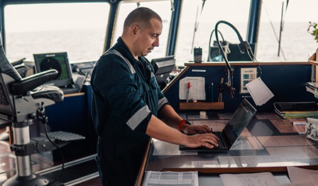 Man working in ship bridge
