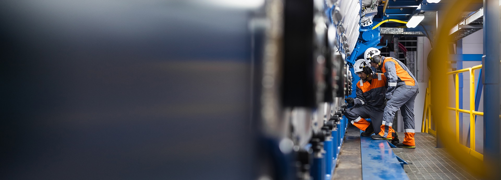 Wärtsilä service employees in the engine room