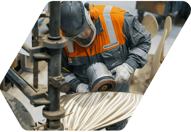 Service employee works on propeller