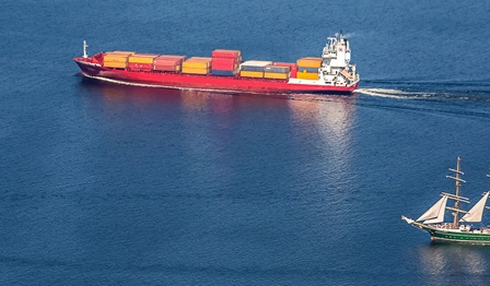 Cargo ship and tall ship in the Baltic Sea