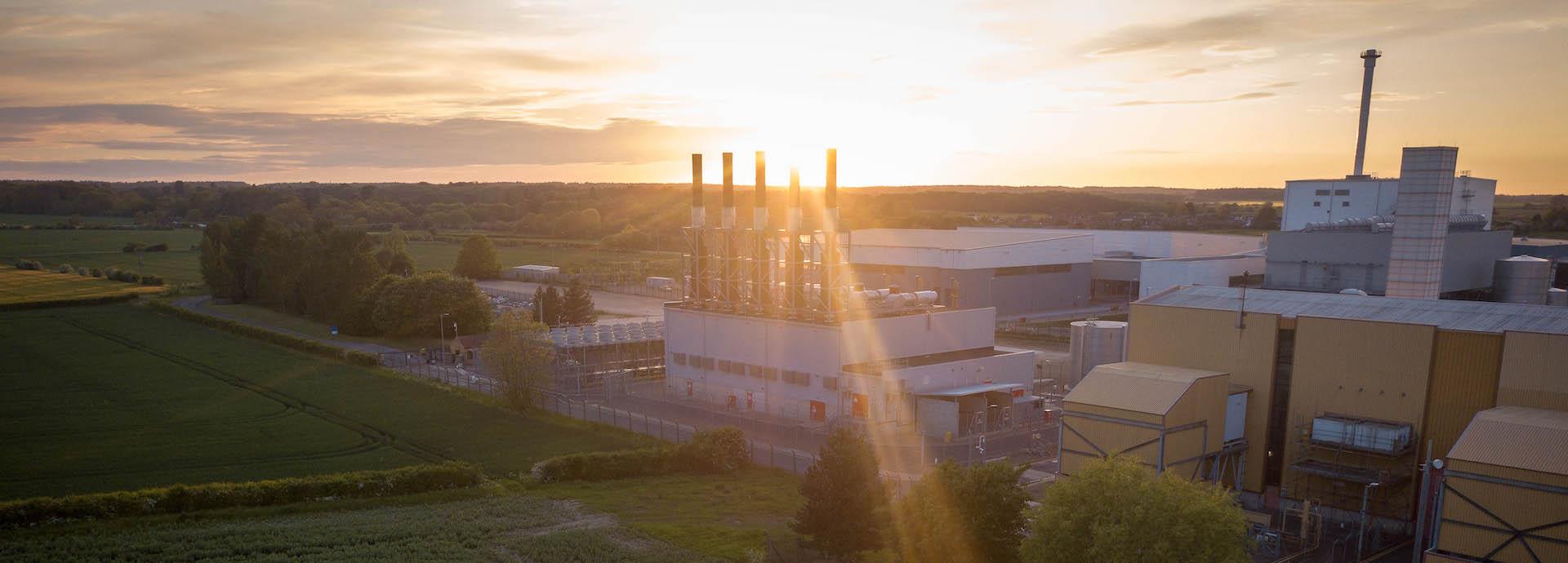 power plant at sunset
